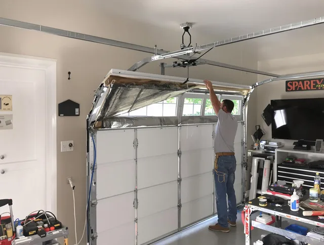 Garage door section replacement by Windsor Locks Garage Door Repair in Windsor Locks