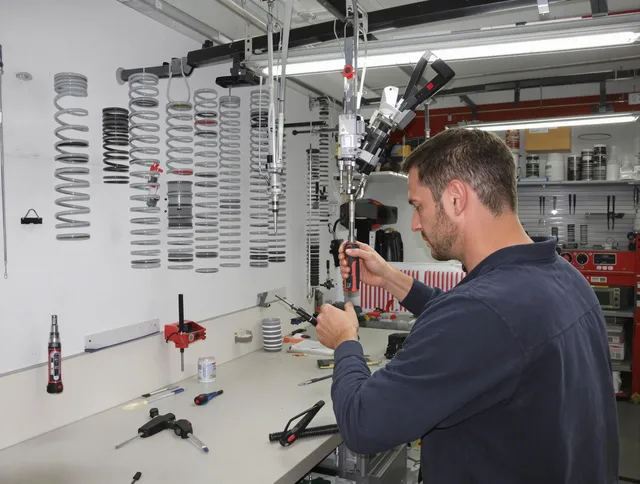 Windsor Locks Garage Door Repair safety certified technician performing precision spring replacement in Windsor Locks