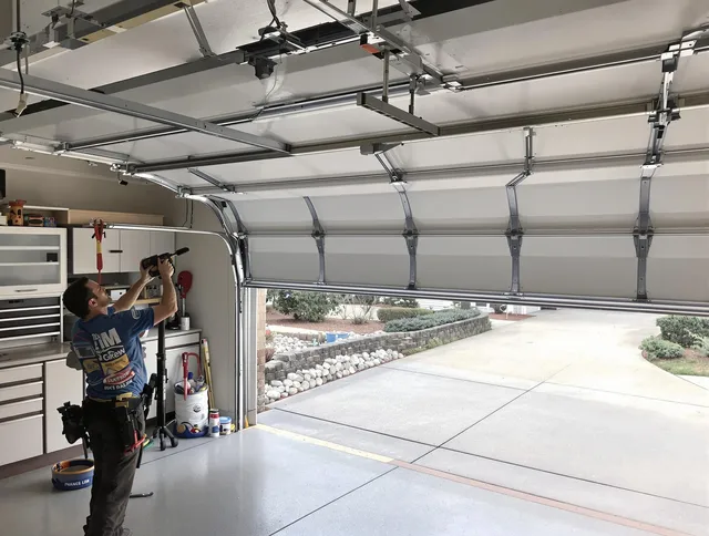 Garage door track repair service by Windsor Locks Garage Door Repair in Windsor Locks
